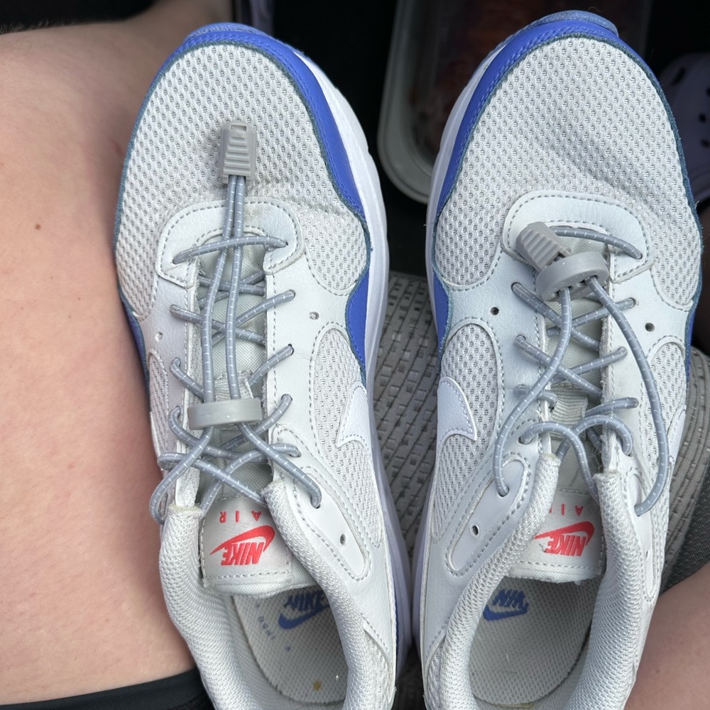 Purple and gray Nike Air
